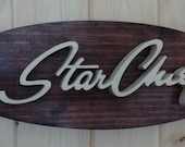 1958 Pontiac Star Chief Emblem Oval Wall Plaque-Unique scroll saw automotive art created from wood for your garage, shop or man cave.