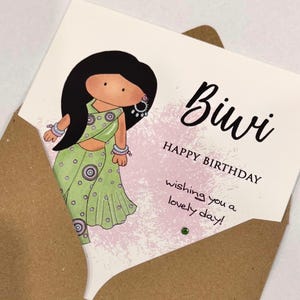 A cute birthday card for a special Biwi (wife) This South Asian lady is dressed to impress in a pastel green sari with matching jewellery. A perfect keepsake card to make her smile. Card front reads, Biwi happy birthday, wishing you a lovely day.