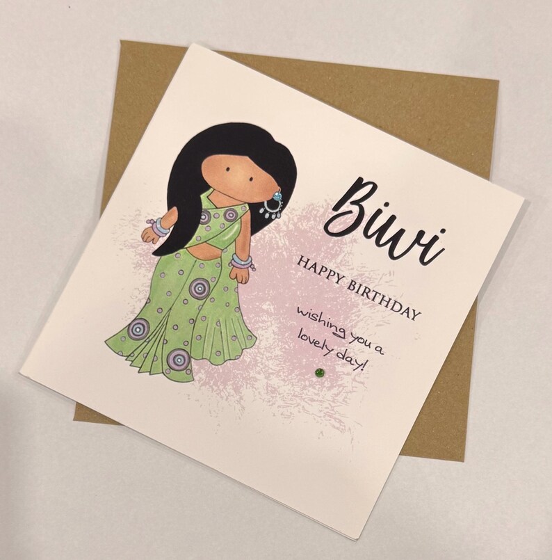 A cute birthday card for a special Biwi (wife) This South Asian lady is dressed to impress in a pastel green sari with matching jewellery. A perfect keepsake card to make her smile. Card front reads, Biwi happy birthday, wishing you a lovely day.