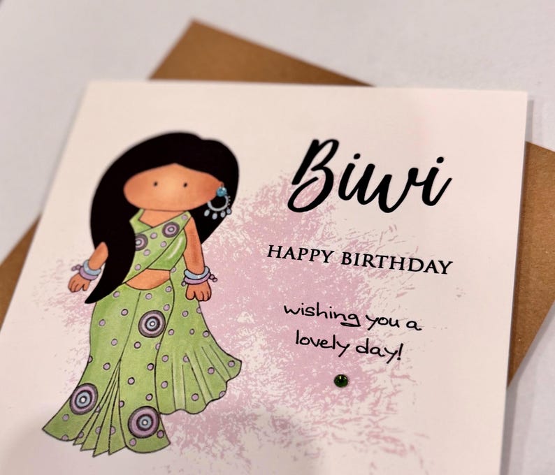 A cute birthday card for a special Biwi (wife) This South Asian lady is dressed to impress in a pastel green sari with matching jewellery. A perfect keepsake card to make her smile. Card front reads, Biwi happy birthday, wishing you a lovely day.