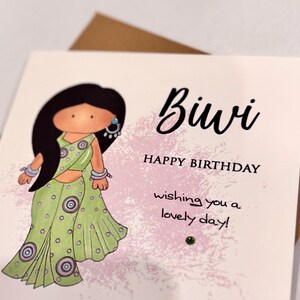 A cute birthday card for a special Biwi (wife) This South Asian lady is dressed to impress in a pastel green sari with matching jewellery. A perfect keepsake card to make her smile. Card front reads, Biwi happy birthday, wishing you a lovely day.