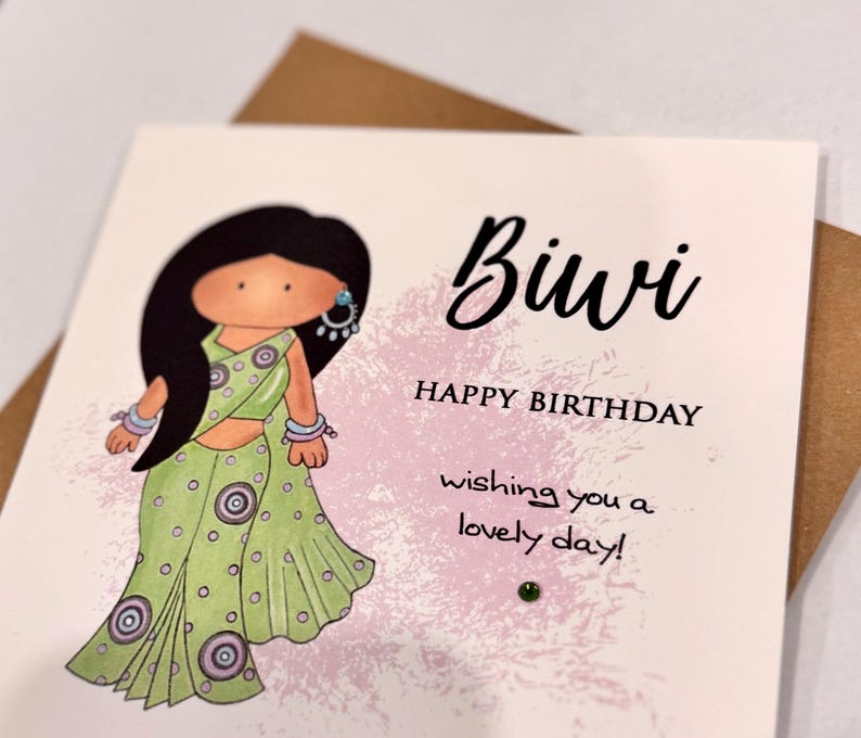 A cute birthday card for a special Biwi (wife) This South Asian lady is dressed to impress in a pastel green sari with matching jewellery. A perfect keepsake card to make her smile. Card front reads, Biwi happy birthday, wishing you a lovely day.