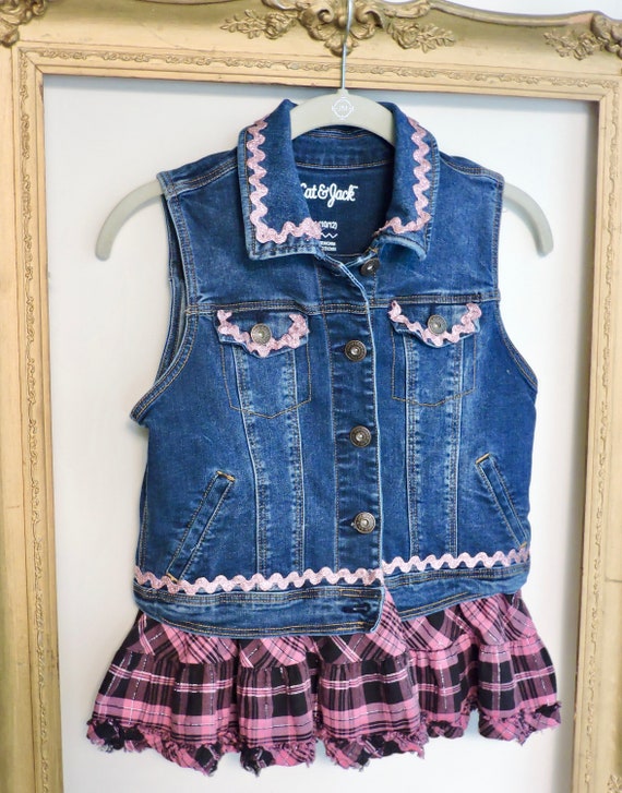 Pink Power Livens up This Denim Vest by 
