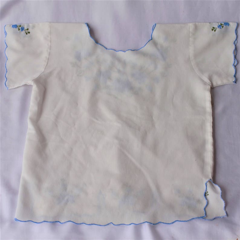 Spectacular SALE Baby Blue Mexican Floral Embroidered Neckline and Hemline Cream Cotton Short Sleeve Slip On Blouse Top Size Small