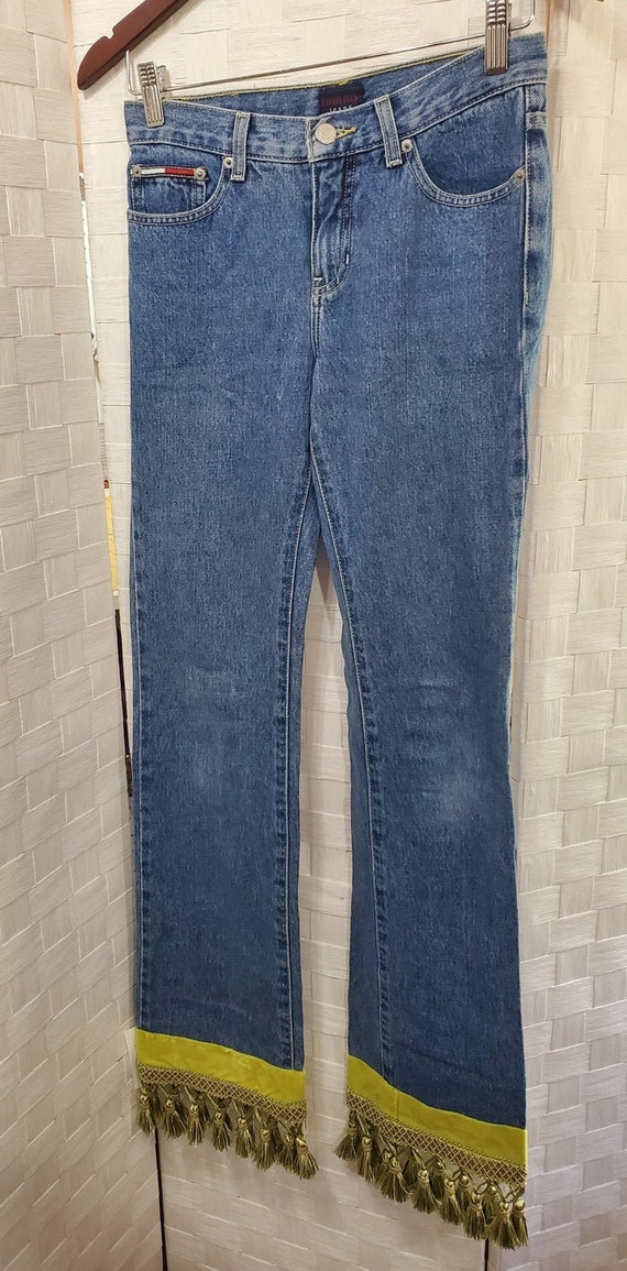 jeans with ribbon on bottom