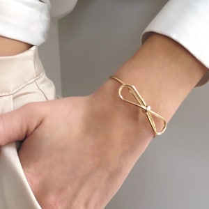 Bow cuff bracelet hotsell