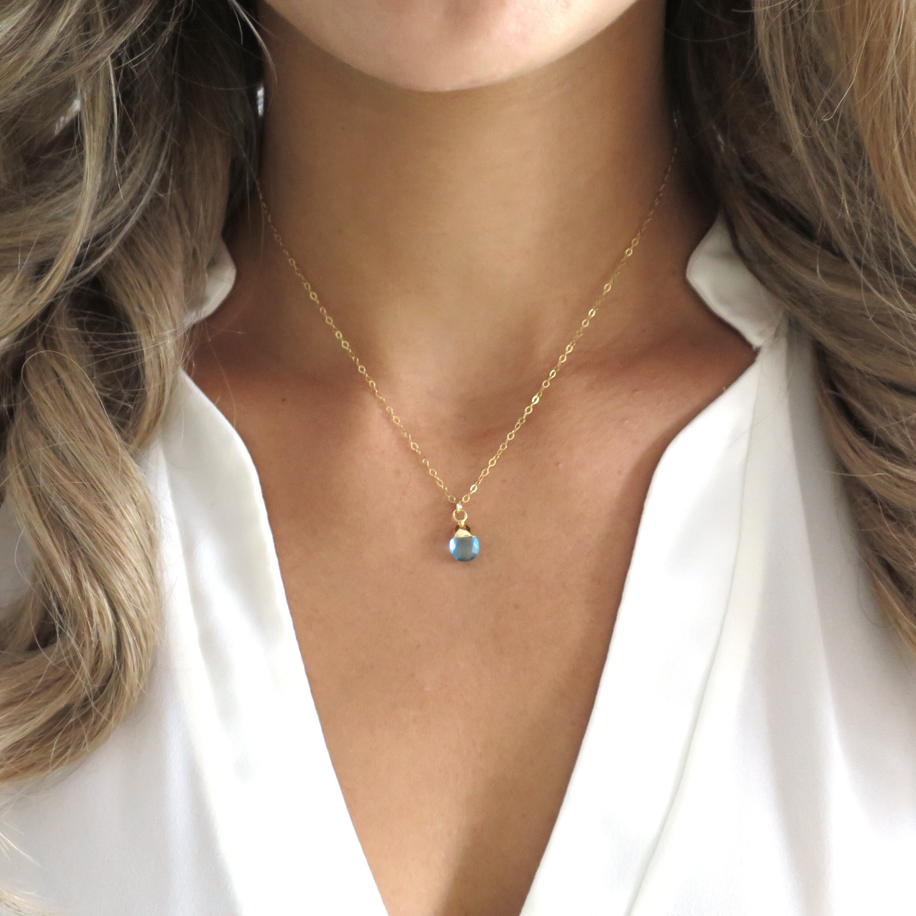 Gold necklace with aquamarine best sale stone