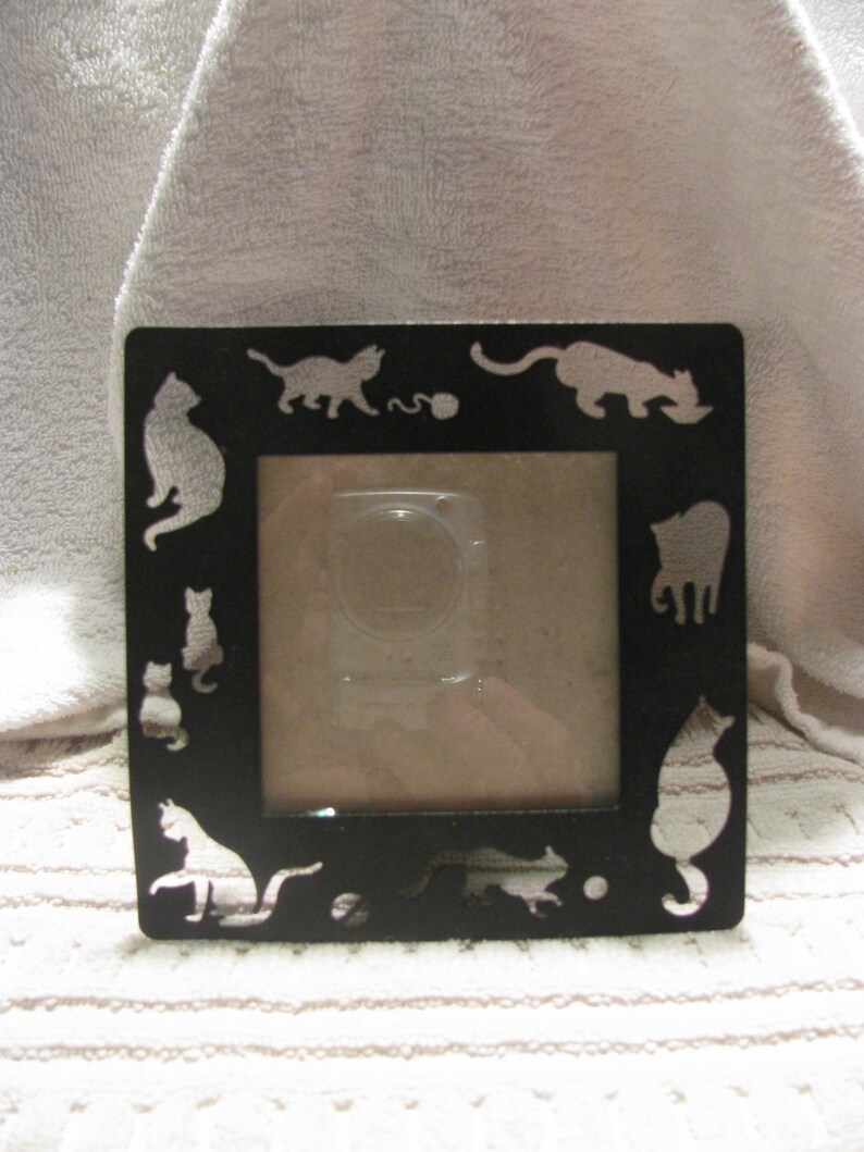 cutout silhouettes! Black metal cat frame