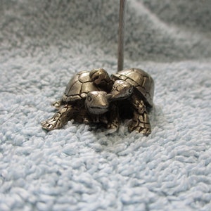 Turtle note or picture holder.