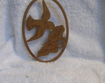 Vintage wood carving of bird and flower - from Grandpas Attic