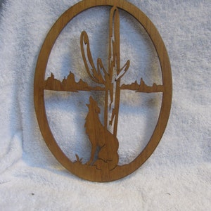 Beautiful carved wolf howling in the desert - Vintage Grandmas Attic