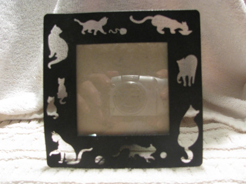 cutout silhouettes! Black metal cat frame
