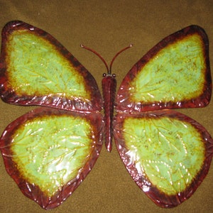 Vintage butterfly metal art.