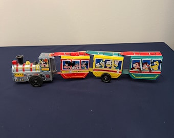 Vintage 1950s-60s Marx tin wind up Disneyland 8400 zig-zag train, Walt Disney Productions