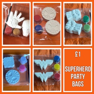 May include: Superhero party bags featuring plaster figures of a hand, Iron Man mask, Spider-Man faces, Hulk fists, a spider web, and Wonder Woman logos. Each bag contains paint pots and a paintbrush.