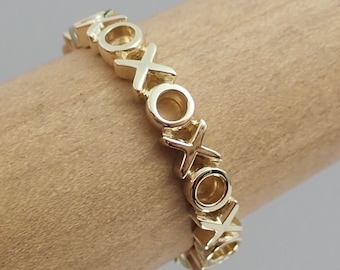 Anillo de eternidad XOXO de oro amarillo de 14 k - Talla 6