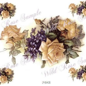 May include: A digital paper with a floral design featuring yellow roses and purple flowers. The design is repeated in the corners of the paper. The text "Wild Rose Sample" appears multiple times on the paper.