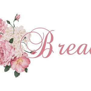 May include: A pink floral design with the word "Bread" in pink script.
