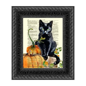 May include: A framed print featuring a black cat with green eyes perched atop two orange pumpkins. The cat is set against a vintage dictionary page background, with green vines and leaves. The frame is black.