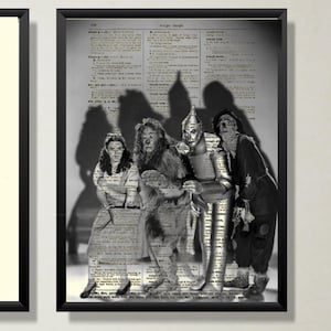 May include: Black and white photograph of the four main characters from The Wizard of Oz, Dorothy, the Scarecrow, the Tin Man, and the Cowardly Lion, standing in front of a dictionary page with the word "rough" highlighted.