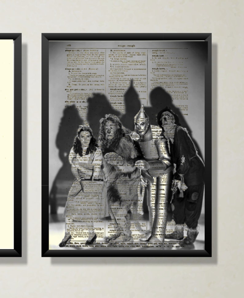 May include: Black and white photograph of the four main characters from The Wizard of Oz, Dorothy, the Scarecrow, the Tin Man, and the Cowardly Lion, standing in front of a dictionary page with the word "rough" highlighted.