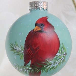 Hand Painted Ornament of a Cardinal with Fir Tree Evergreen
