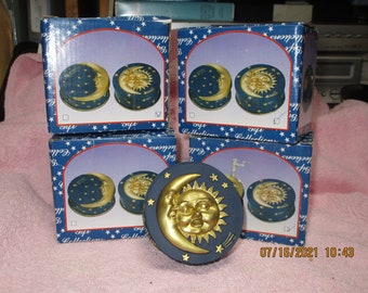 The Sun and moon ceramic trinket boxes.