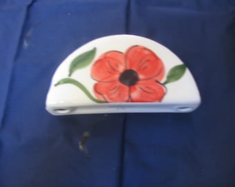 Handpainted napkin holder.