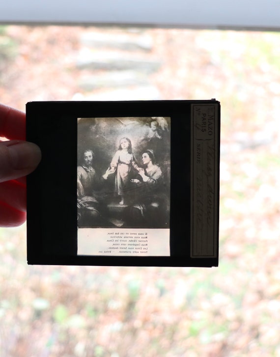 Magic Lantern Slide with Mary, Joseph, the Christ Child, and the Holy Spirit; French; Circa Early 1900s