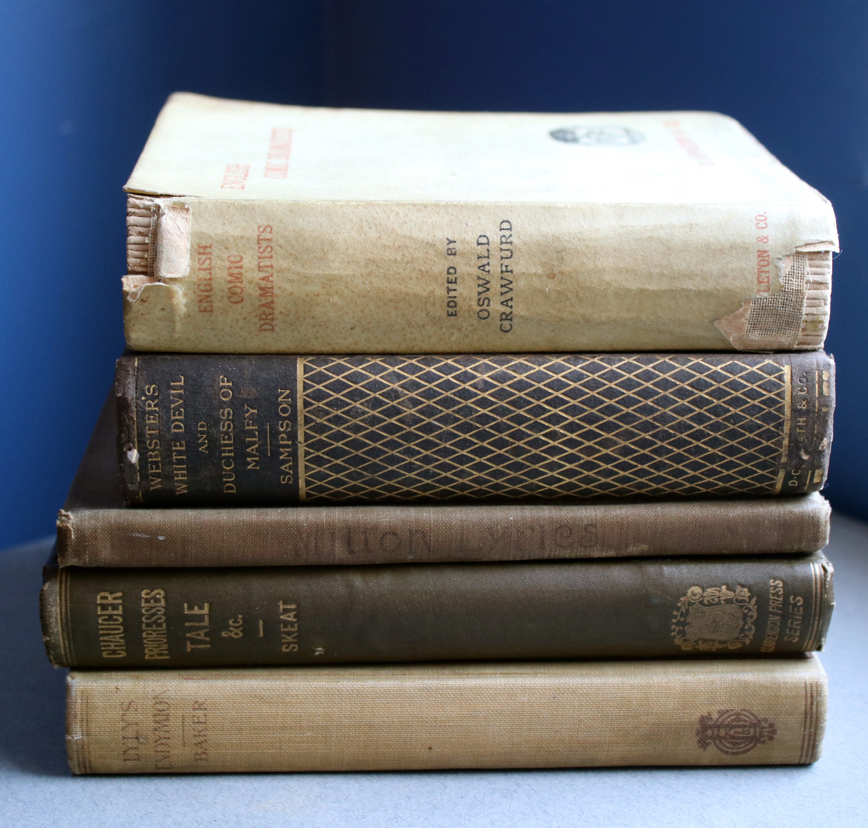 Stack of Antique Books in Neutral Colors