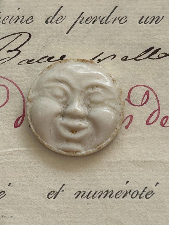 Man in the Moon Ceramic Fève