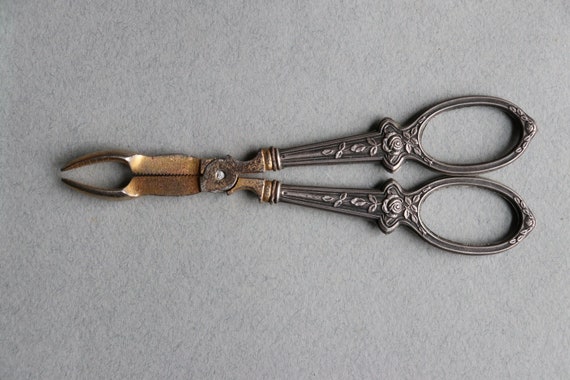 French Sugar Tongs with Rose Floral Design on Silver Handles with Boar's Head Mark