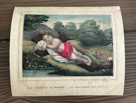Le Sauveur du Monde/El Salvador del Mundo (The Savior of the World), Hand-Colored Engraving of the Christ Child Asleep on a Cross, Mid 1800s