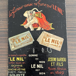 Cartel publicitario de papel para cigarrillos Le Nil