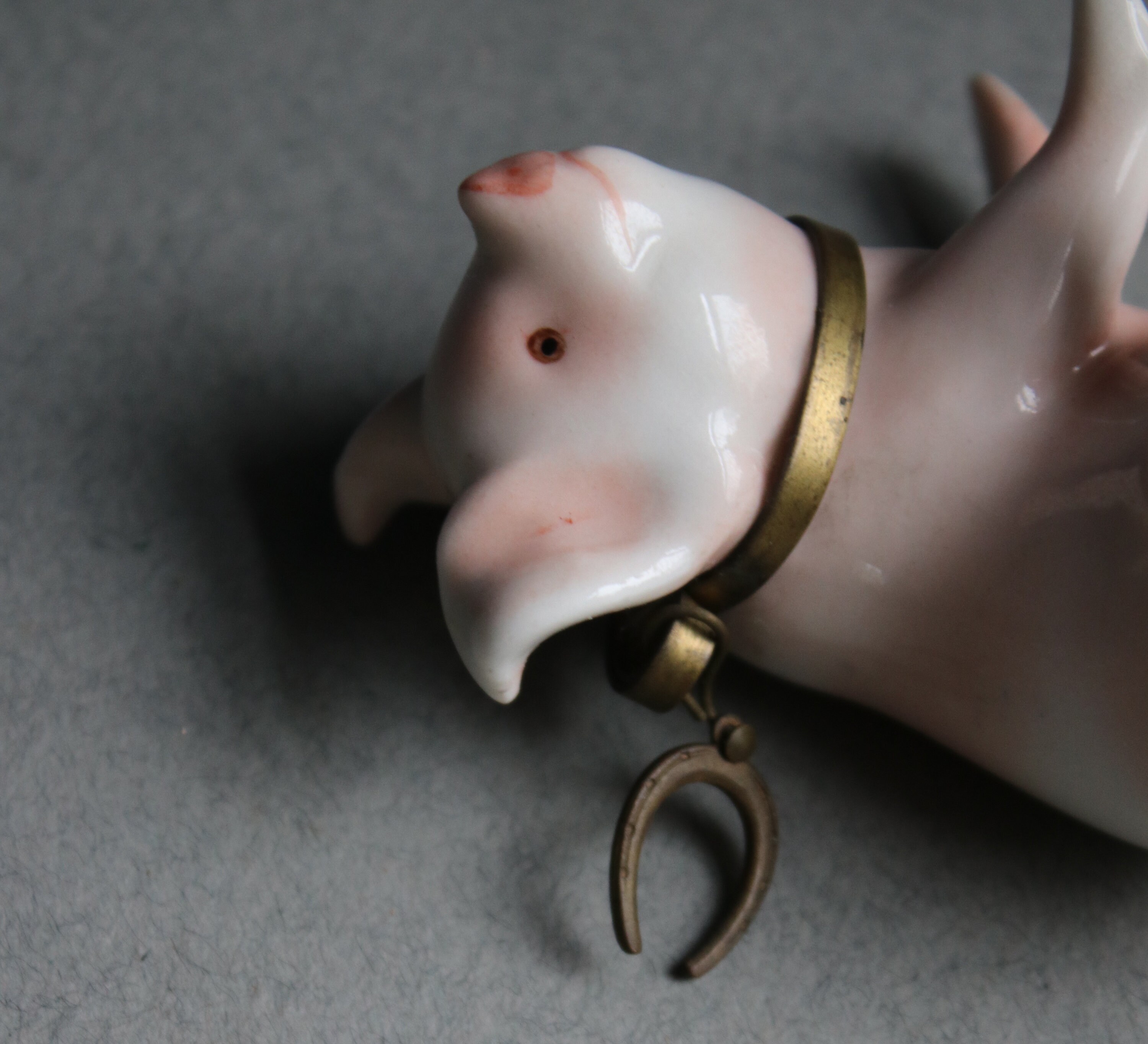 Pink and White Porcelain Pig Figurine with Horseshoe Collar