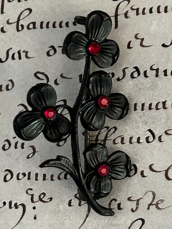 Antique, Black Floral Brooch with Red Stones
