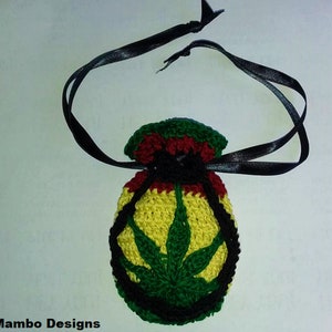 May include: A small crocheted pouch with a black drawstring and a green marijuana leaf design. The pouch is made in the colors of the Jamaican flag: red, yellow, and green.