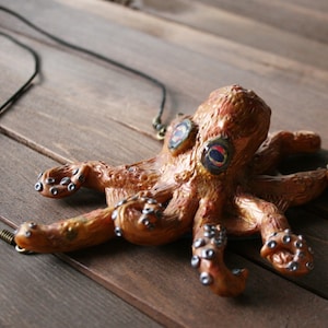 Sculpted Octopus pendant with black cord