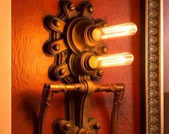 Hesterion Wall Sconce: a hand made light fixture in an Industrial Style