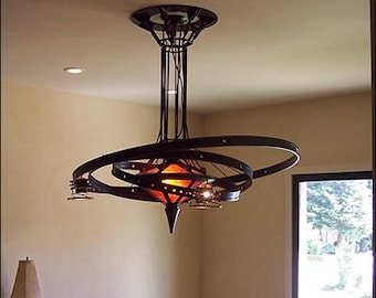 the Chandrian Orrery Chandelier: a hand-made steampunk styled lamp