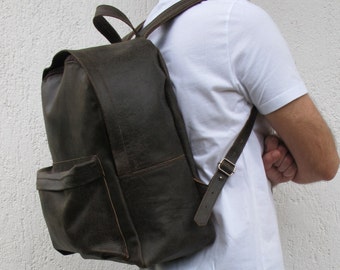 Leather Backpack available in 16 colors and two sizes. Unisex