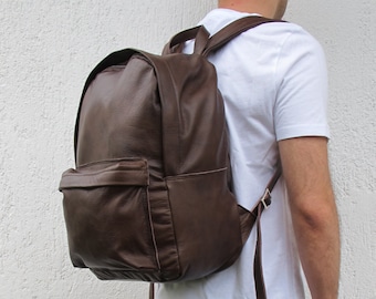 Brown Leather Backpack available in 16 colors and two sizes. Unisex