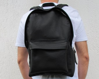 Leather Backpack available in 16 colors and two sizes. Unisex