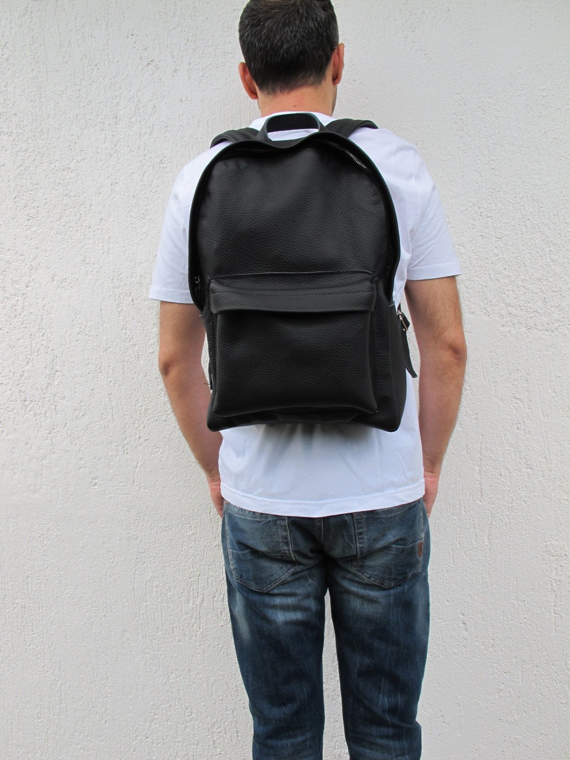 Leather Backpack available in 16 colors and two sizes. Unisex