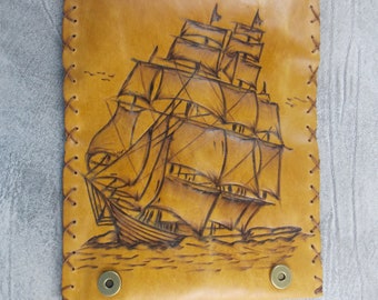 Leather tobacco pouch with the pyrography of a ship