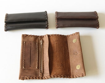 Handmade leather tobacco pouch avaliable in three colors.