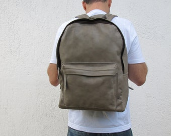 Men Leather Backpack available in 16 colors and two sizes. Unisex