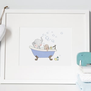 May include: A framed illustration of an elephant and a rabbit taking a bath in a blue bathtub with bubbles. There is a yellow rubber ducky and a bottle of soap in the tub. A blue wooden elephant figurine is on a white towel.