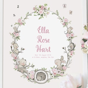 May include: A floral wreath with a pink background and a white border. The wreath is made of branches with pink flowers and leaves. There are small animals in the wreath, including a bird, a rabbit, a bear, a hedgehog, and a mouse. The text "Ella Rose Hart" is in the center of the wreath, along with the text "Born 7th August 2019 at 6.58am, weighing 7lbs 8oz."