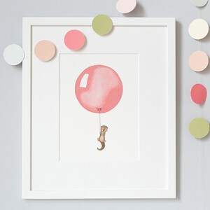 May include: A framed illustration of a small brown animal holding onto a pink balloon string. The illustration is surrounded by a white frame and a garland of pastel colored circles.